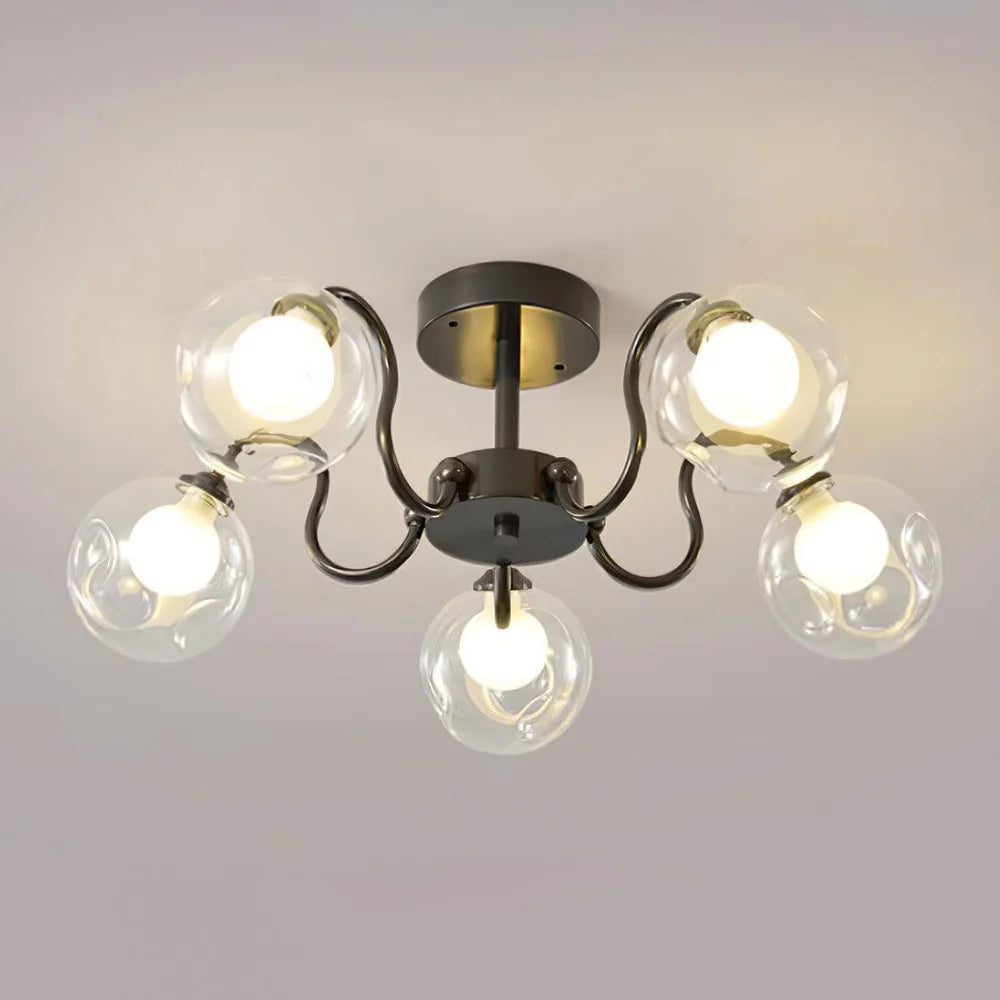 Lustre plafonnier verre globe en ambiance salon - Maison Lumexia